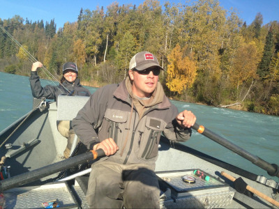Steelhead guide rowing drift boat