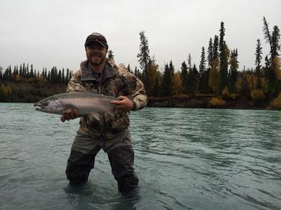 Angler holding Steelhead