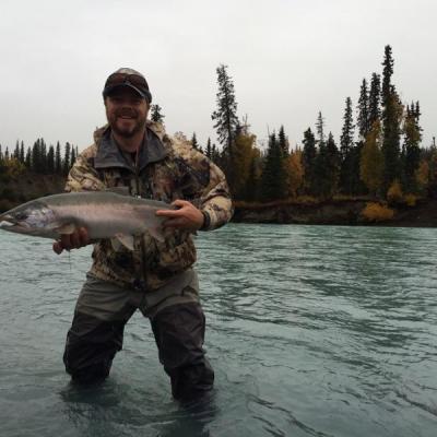 Angler holding Steelhead