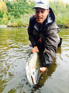 Showing off a large Steelhead Buck
