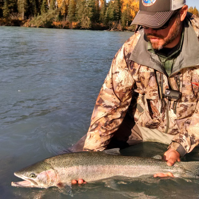 Angler holding a Steelhead