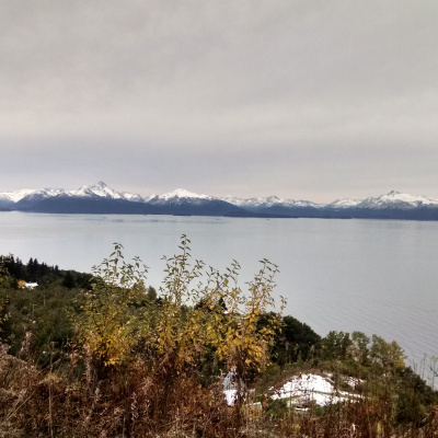 Snow capped Alaskan peaks and ocean view