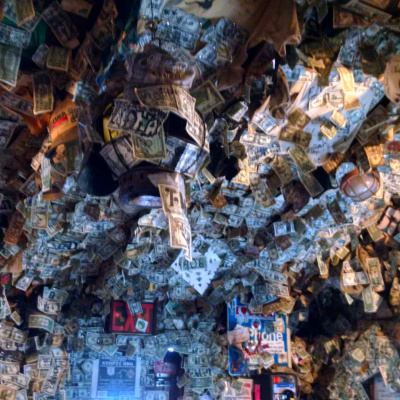 Homer Alaska bar walls covered in dollar bills