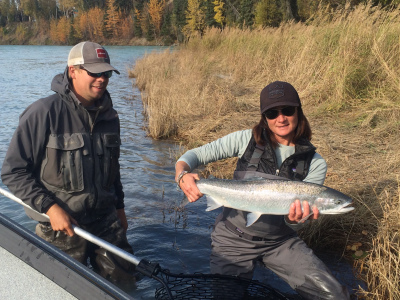 Guide and angler with a bright Steelhead