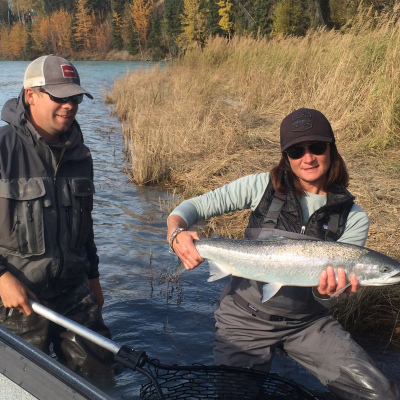 Guide and angler with a bright Steelhead