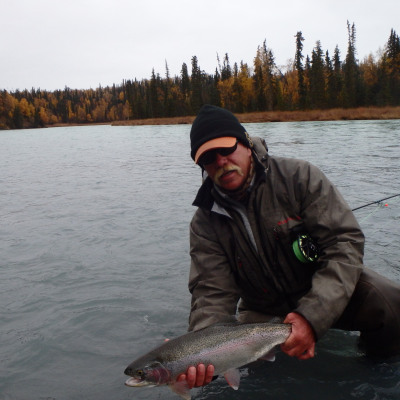 Angler releasing Alaska Rainbow