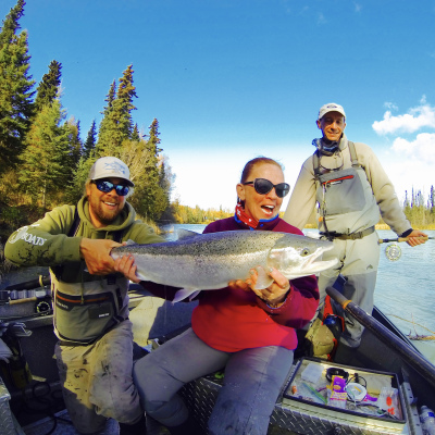 Group of 2 anglers and guide with Steelhead in jetboat