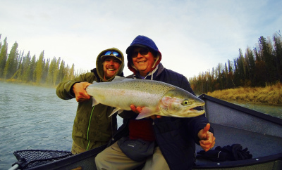 Guide and client show off trophy Alaska Steelhead