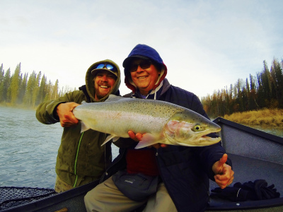 Guide and client show off trophy Alaska Steelhead