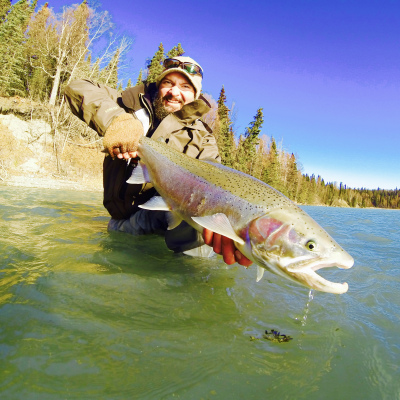 Angler shows off large Alaska Steelhead