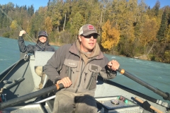 Steelhead guide rowing drift boat