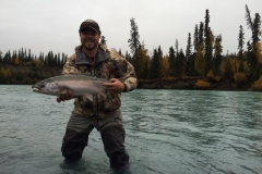 Angler holding Steelhead