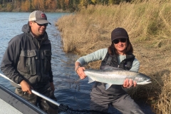 Guide and angler with a bright Steelhead