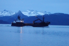 Time Bandit fishing boat steaming through harbor