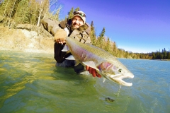 Angler shows off large Alaska Steelhead