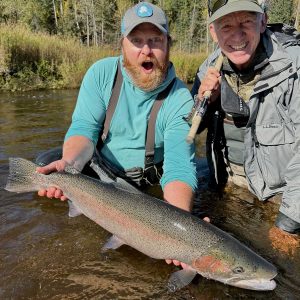Justin Miller and client with steelhead